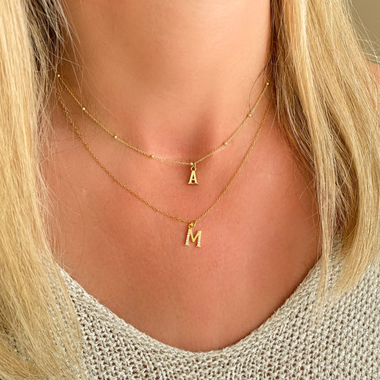 Initial silhouette silver