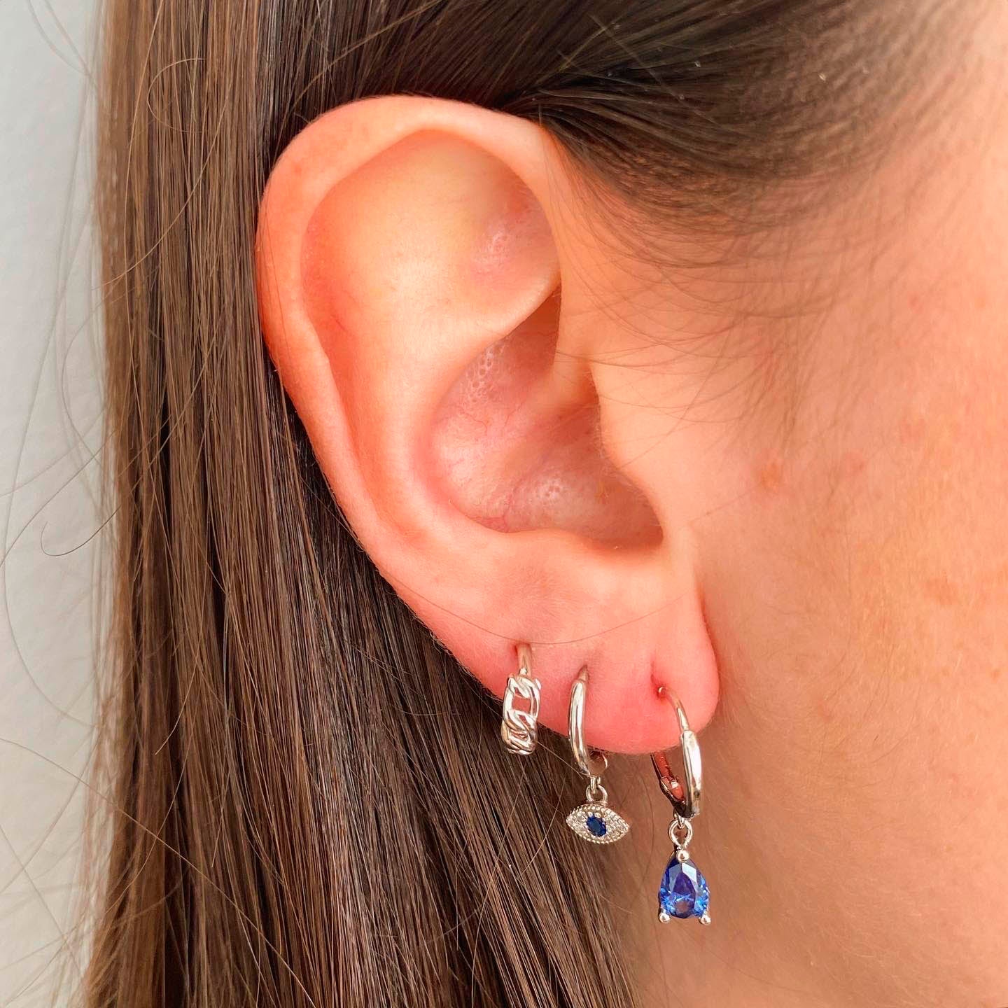 Blue tear hoop silver