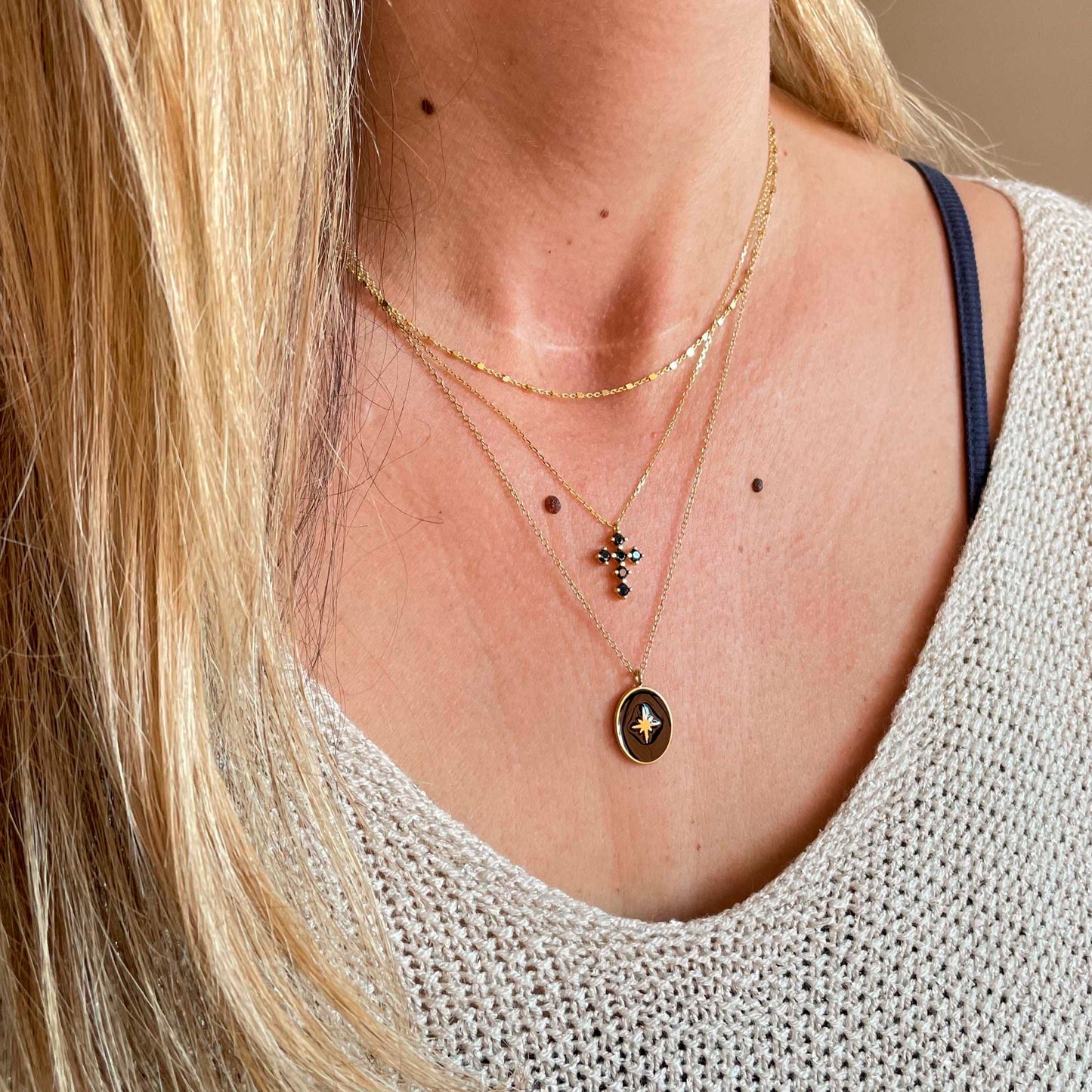 Black zirconia cross gold