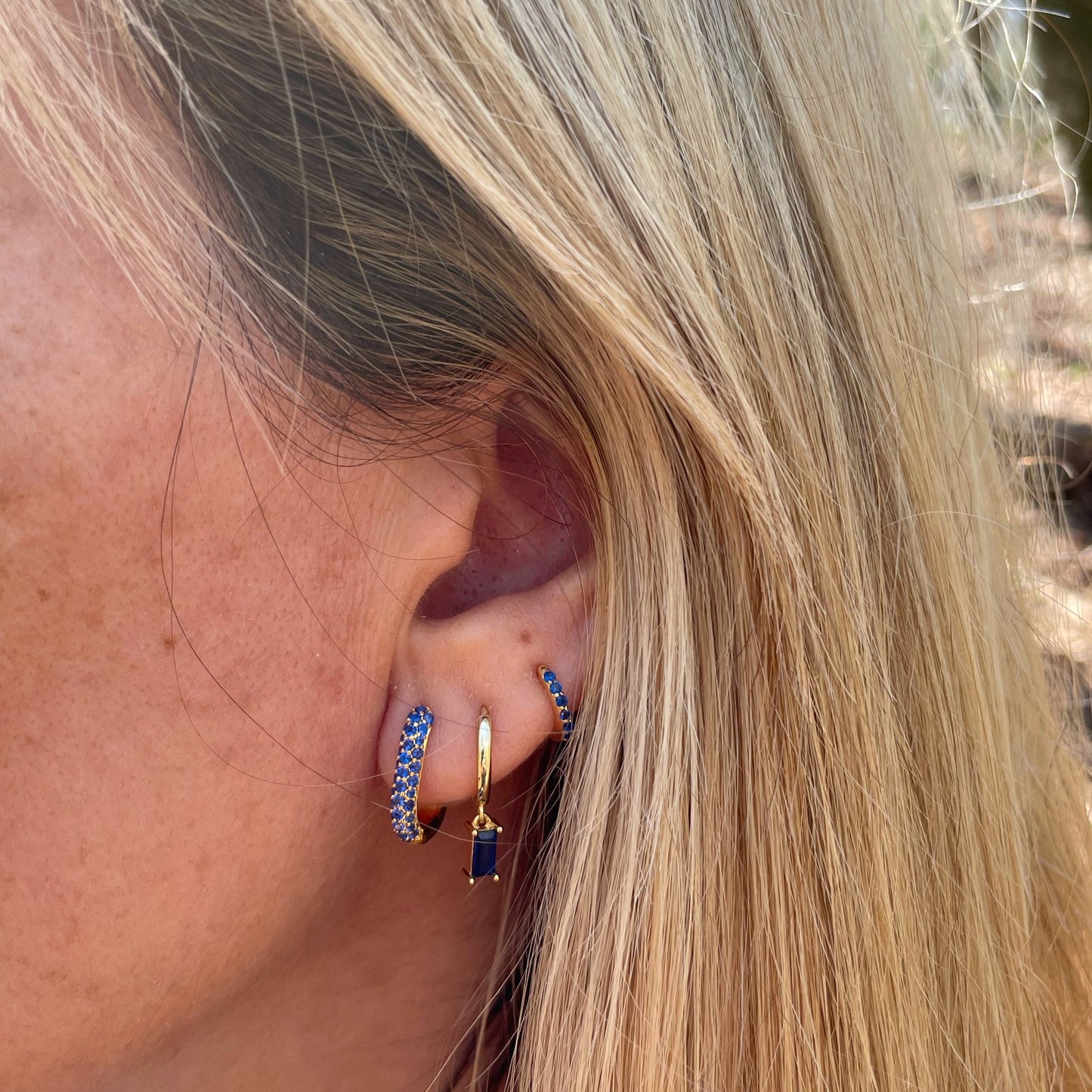Blue zirconia oval hoop gold